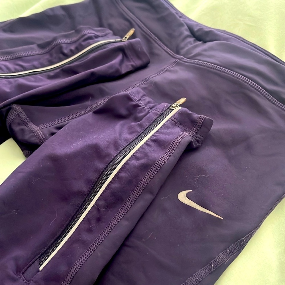 Nike Dri-Fit Purple Women’s Leggings Split-Hem zippers w back waist pocket